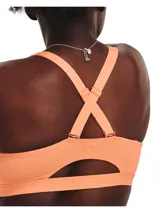 Top deportivo Under Armour con tecnología UA SmartForm, diseñado para soporte medio. Presenta un diseño de escote en V con relleno moldeado, paneles de malla estratégicos para mayor transpirabilidad y tirantes ajustables. Confeccionado en tejido elástico que absorbe el sudor y se seca rápidamente.