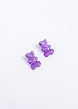 Par de aros con forma de ositos de goma color violeta.