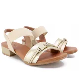 Sandalia de cuero negra con elástico en el tobillo, taco bajo y hebilla decorativa.