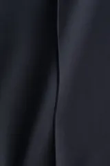Pantalón de corte holgado en punto pesado con leve brillo, color negro. Modelo con elástico revestido en la cintura, bolsillos al bies y piernas rectas con pliegues cosidos.