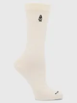 Calcetín de largo medio en color beige, confeccionado en tejido suave con puño elástico y logo bordado del perro de la marca en la parte superior.
