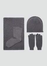 Guantes de punto de cachemira en color gris, con diseño clásico y puño elástico acanalado.