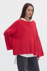 Sweater de punto negro con cuello bote y mangas evasé, confeccionado en algodón con diseño holgado.