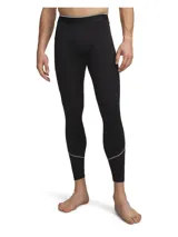 Calza deportiva larga Under Armour HeatGear Elite, color negro, con cintura elástica visible y paneles de malla en la entrepierna para mayor ventilación. Diseño ergonómico con costuras estratégicas para mayor durabilidad y libertad de movimiento.