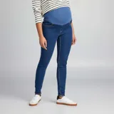 Jegging de jean azul oscuro con panel elástico azul en la cintura para mayor comodidad durante el embarazo.