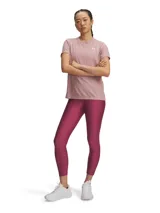 Calza Under Armour color fucsia, de corte capri, con cintura alta antideslizante y tecnología HeatGear®.