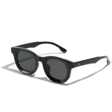 Lentes de sol con armazón de acetato negro y diseño de marco redondeado. Cuentan con protección UV400.
