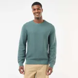 Sweater de punto fino con cuello redondo, manga larga y puños acanalados, de diseño liso y corte estándar.