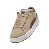 Championes Puma modelo Suede XL, color azul vibrante con detalles en blanco. Presentan un diseño clásico de gamuza con cordones anchos, suela de goma texturizada y el logo de la marca en dorado en el lateral.