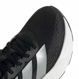 Championes de running Adidas Galaxy 8 W para mujer, de color negro con las clásicas tres tiras en tono plateado y una suela de plataforma blanca con amortiguación texturizada.