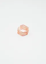 Anillo ajustable color oro rosa con cuatro líneas horizontales y zirconias.