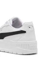 Championes Puma Karmen II L, modelo de plataforma en color blanco con franja lateral negra.