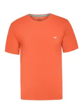 Remera de jersey de algodón orgánico color rosado, con cuello redondo, manga corta y detalle de parche con logo contrastante en el pecho de la marca RKF.