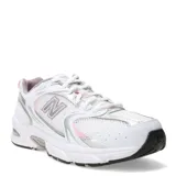 Championes New Balance 530 de mujer, blancos con detalles plateados y rosados.