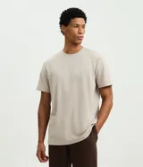 Remera deportiva de hombre Get Over, modelo comfort de manga corta y cuello redondo en color beige, confeccionada en tech fleece con tecnología dry.
