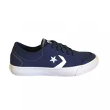 Championes Converse Stoke Ox azul marino con logo estrella y galón en blanco.