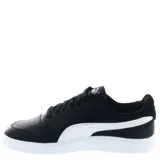 Championes urbanos Puma modelo Shuffle, color negro con detalles en blanco. Presentan una silueta de corte bajo, confeccionados en cuero sintético con perforaciones en la puntera y plantilla SoftFoam+ para mayor amortiguación.