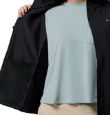 Campera softshell híbrida Columbia, modelo Trailborne, color negro, con capucha, cierre frontal y bolsillos con cremallera. Incorpora tecnología Omni-Shield de repelencia al agua y a las manchas.