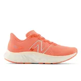 Championes de running New Balance Fresh Foam X Evoz v4 color naranja con logo blanco.