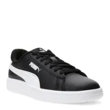 Championes Puma modelo Smash 3.0 Leather, de diseño urbano y clásico. Presentan una capellada de cuero sintético en color negro con la icónica franja lateral de la marca en color blanco y suela de goma blanca.
