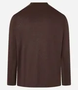 Remera deportiva de manga larga con cuello redondo, confeccionada en tejido técnico Dry Fit. Presenta un diseño liso en color negro con detalles reflectantes en los hombros.