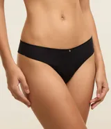 Kit de dos bombachas bikini de microfibra, una blanca y otra negra, con elástico en la cintura y colgante de moneda.