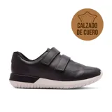 Championes de cuero negro con ajuste de velcro y suela blanca.