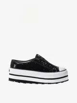 Zapatilla slipper negra cubierta de lentejuelas, con plataforma blanca de 6 cm de altura.
