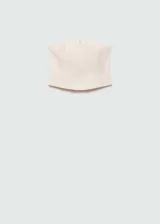 Top strapless de corte crop y diseño entallado, con cierre frontal de cremallera invisible y textura de rayas verticales sutiles.