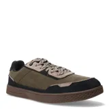 Championes Caterpillar modelo Pause Retro Leather, de estilo urbano con diseño retro. Presentan una combinación de cuero y gamuza en tonos verde oliva, negro y beige, con suela de goma con textura de panal y logo grabado en el talón.