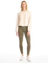 Legging de tiro alto confeccionada en algodón elástico con cintura ancha modeladora. Presenta un calce ajustado y tejido opaco de tacto natural.