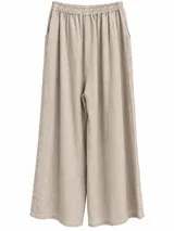 Pantalón wide leg de lino color beige, con cintura elástica fruncida y detalle de botones en los tobillos.