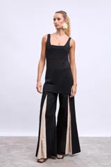 Blusa marrón de punto con breteles anchos.