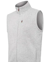 Chaleco gris melange modelo York de RKF, confeccionado con poliéster reciclado. Presenta exterior tipo tejido sweater jaspeado e interior de suave micropolar, con cuello alto, cierre frontal completo, bolsillos laterales y un bolsillo con cierre en el pecho.