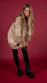 Botas bucaneras negras de cuero sintético con plataforma y cierre lateral.