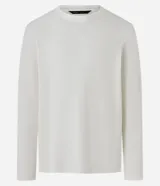Remera de manga larga color blanco, confeccionada en tejido waffle texturizado, con cuello redondo y corte regular.
