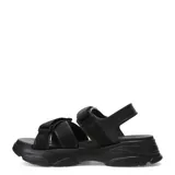 Sandalias de plataforma chunky color negro, con tiras anchas de tela y ajuste con velcro en el empeine y el talón.