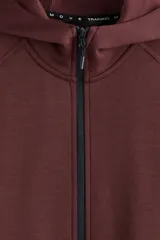 Campera deportiva de tejido funcional con efecto neopreno, con capucha, cierre frontal y bolsillos laterales con cierre. Presenta mangas raglán y terminaciones elásticas en puños y bajo.
