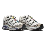 Championes Salomon modelo XT-6 de color negro, diseñados para trail running y uso urbano, con sistema de ajuste rápido Quicklace y suela con gran tracción.