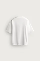 Camiseta de algodón con cuello redondo y mangas cortas, de corte relaxed fit y efecto lavado gris.