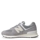 Championes New Balance modelo 574, color gris con detalles en blanco, confeccionados en gamuza y malla, con logo "N" característico en los laterales y entresuela ENCAP.