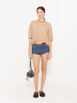 Sweater negro de lana merino y algodón, de mangas cortas y corte amplio.