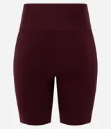 Bermuda deportiva de poliamida color celeste, de tiro alto con cintura ancha y ajuste ceñido al cuerpo.