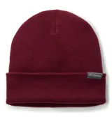 Gorro tipo beanie de punto color bordó con vuelta en el borde y etiqueta pequeña con el logo de la marca Columbia en gris.