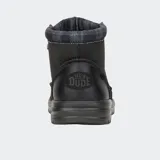 Botas Hey Dude Bradley Classic de caña media, color gris oscuro, con cordones verdes y suela marrón.