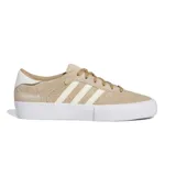 Championes Adidas modelo Matchbreak Super, color beige con detalles en blanco. Confeccionados en gamuza con las icónicas tres tiras laterales y suela de goma blanca.