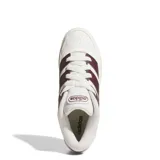 Championes urbanos Adidas Break Start 2000, color blanco con detalles en bordó. Presentan el diseño clásico de las tres tiras laterales, puntera perforada para mayor ventilación y suela de goma resistente.
