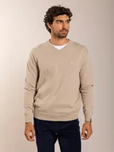 Sweater azul marino de algodón con cuello en V y logo bordado en el pecho.