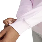 Buzo deportivo Adidas Essentials Linear French Terry color lila, de corte clásico, cuello redondo y logo estampado en el pecho.