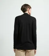 Cardigan largo de tejido de punto, color terracota, con mangas largas y diseño abierto sin cuello ni cierres.